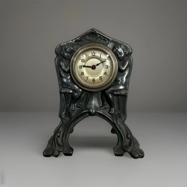 This listing is for a gorgeous antique desk clock. This clock is most likely of German origin. It features an Art Nouveau...