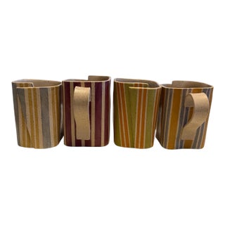 Late 20th Century Signed Postmodern Hand-Built Studio Art Pottery Striped Stoneware Mugs by Leah Sheves Set of Four For Sale