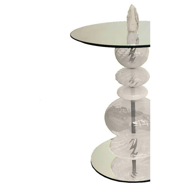 Our Abacus Pieces were intellectually conceived as vertical timelines with each sphere representing a time period or...