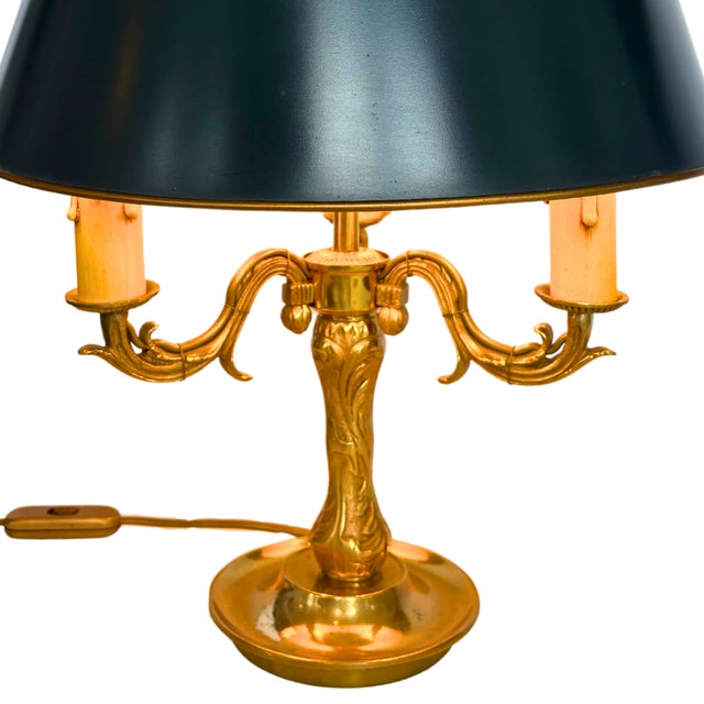 A refined 19th-century French Bouillotte lamp in the Louis XVI style, showcasing an elegant ormolu (gilded bronze)...