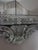 This exquisite Venetian etched glass wall mirror is a stunning example of Italian craftsmanship. It features a large...