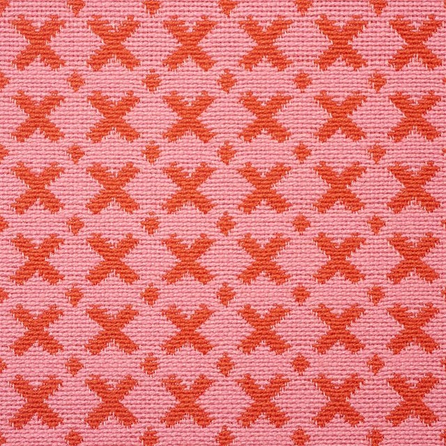 This straightforward and simple graphic woven is reversible, made from natural fibers, and is well priced, too....