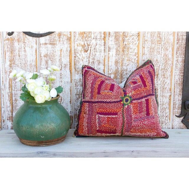 Quilted by the gypsy woman of the Saami community often reusing fabrics from clothing. This antique tribal pillow feature...