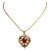 A 22K gold pendant with precious and semi-precious gemstones depicting the Navratna mythology on one side and kundan gold...