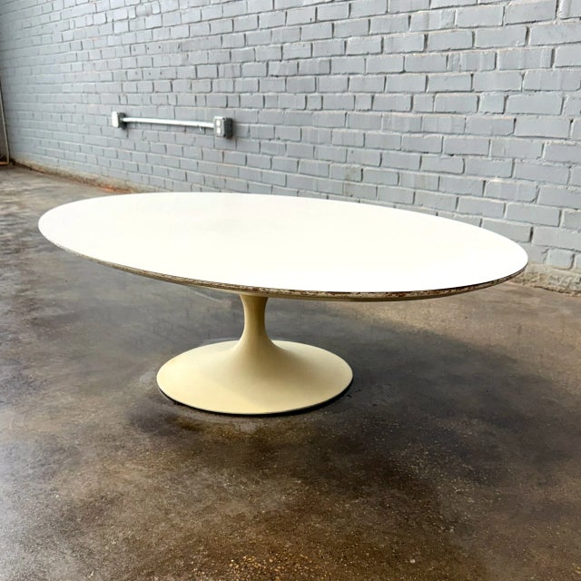 An absolute design classic. This coffee table is being offered in original condition. There is minor chipping to the outer...