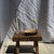 Small rectangular teak stool in wabi-sabi style. Minimalist, raw design; a beautiful piece (thickness and quality of the...
