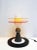 Ettore Sottsass 'Bay' table lamp for Memphis Milano, design 1983. In painted metal, glass and acrylic glass. This piece...