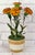 An exceptional composition combining a porcelain floral arrangement entirely handcrafted by master ceramic artist Didier...
