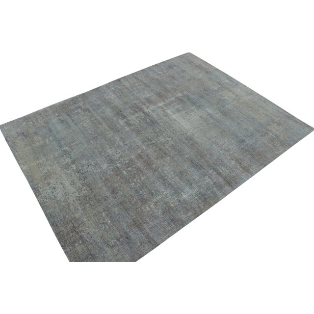 This 9×12 abstract rug is a new addition to Rug & Kilim’s bold modern rug designs. Hand-knotted in wool and silk. Further...