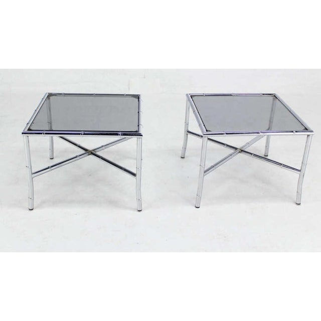 Pair of Chrome Faux Bamboo X Base End Side Tables Stands with Smoked Glass Tops Mid Century Modern Bauhaus.