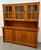 Beautiful mid-century Danish teak china hutch and credenza, showcasing the warm, rich tones and clean architectural lines...