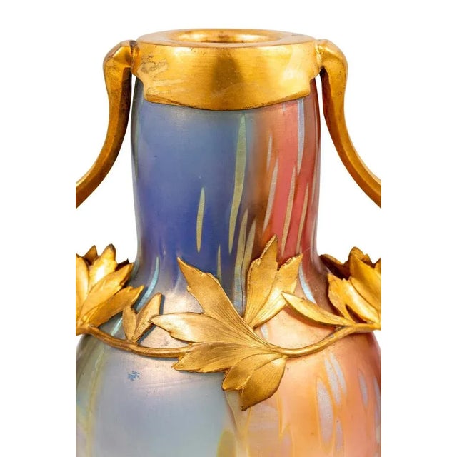 Glass vase manufactured by johann loetz witwe tricolore decoration tin metal mounting designed by bitter & gobbers ca....