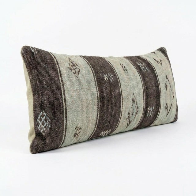 This beautiful 16'' x 45'' hand-woven Kilim pillow cover was made from an authentic Turkish kilim. The traditional flat-...