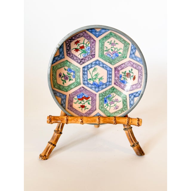 Made exclusively for Neiman Marcus in the 1970s, this stunning pink, green, and periwinkle hexagon Chinoiserie hand...