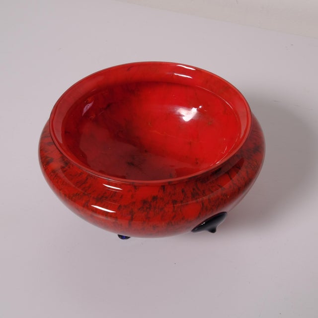 Beautiful red Murano glass vase with a marbled effect, with blue glass feet and decorations. Dimensions: Maximum diameter...