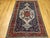 "Early 20th Century Vintage Persian Bakhtiari Bibibaft Area Rug beautifully hand knotted by the skilled weavers of...