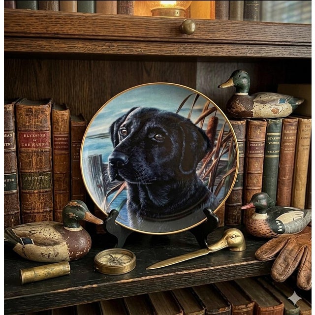 Celebrate the timeless charm of the Black Labrador with this vintage Franklin Mint collector plate from the “Man’s Best...
