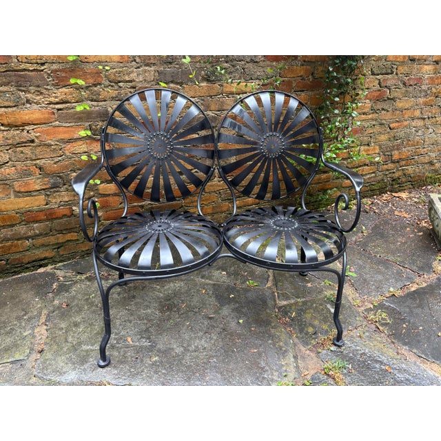 no maker's mark iron frame, spring steel seats and back... vintage version of classic loveseat. shipping from athens, ga