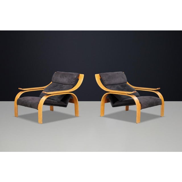 Pair of Woodline Lounge Chairs by Marco Zanuso for Arflex, Italy, 1960s An iconic pair of Woodline lounge chairs designed...
