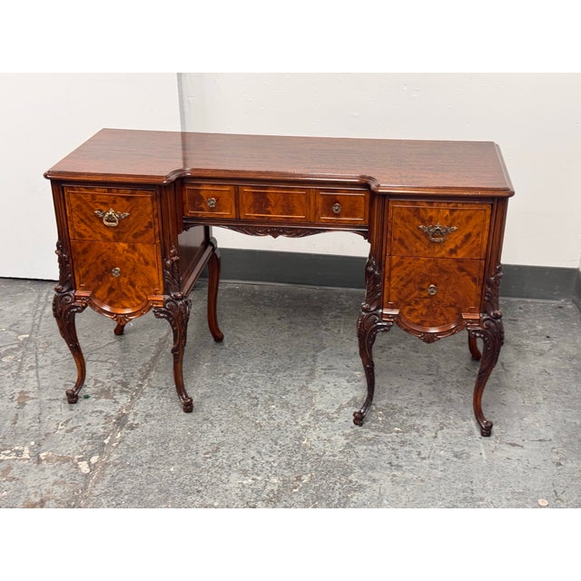 Design Plus Gallery presents an American 1920's Tiger Mahogany Desk/ Vanity. This desk or vanity showcases tiger mahogany...