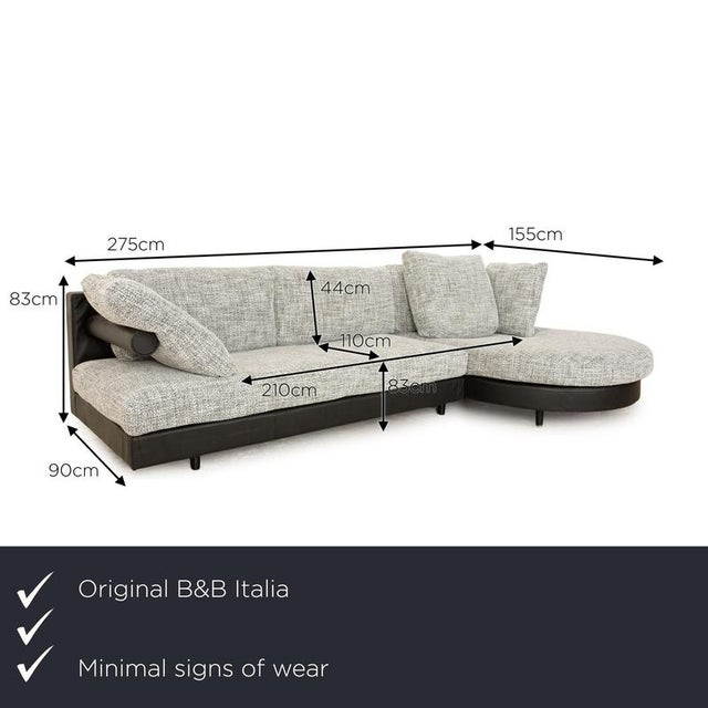 The Sity corner sofa from B&B Italia has been reupholstered in a black-grey fabric. and stands on narrow feet. It is...