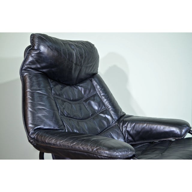 Norwegian Leather Swivel Chair from Skoghaug, 1960s, in Very Good conditions. Designed 1960 to 1969 This piece has an...