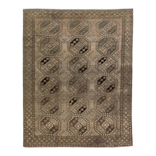 1930s Antique Handmade Persian Turkmen Wool Rug With Geometric Motif in Light Brown For Sale