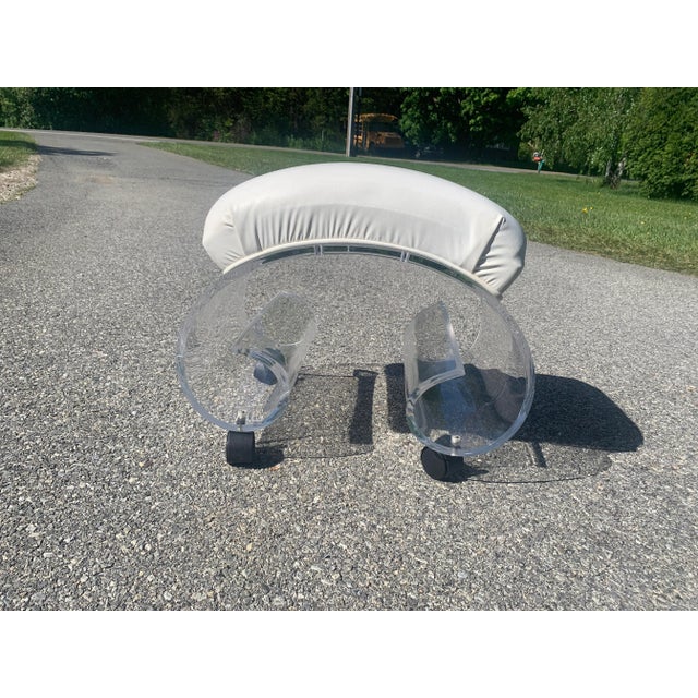 Super adorable lucite vanity stool is also the perfect height for a foot stool. Original white vinyl is in very good...