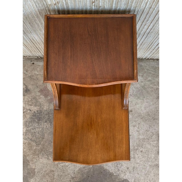 These elegant antique tables were created in Provence, France, circa 1920. Each fruitwood cabinet stands on cabriole legs...