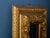Refined 18th-century Italian wooden frame finely carved and gilded with gold leaf, featuring rich decoration with scrolls,...
