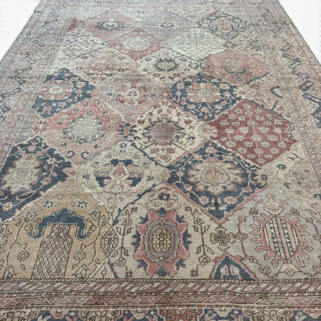 This exquisite antique Gordes rug, handwoven in Turkey approximately 110 years ago, is a refined example of Anatolian...
