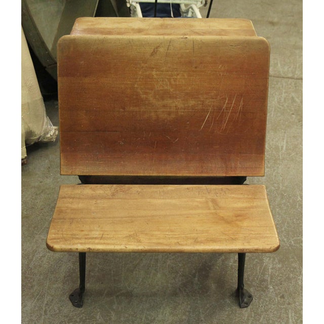 New Oxford #4 cast iron school desk with oak slab seat and desk. New Oxford patented their now-classic school desk design...