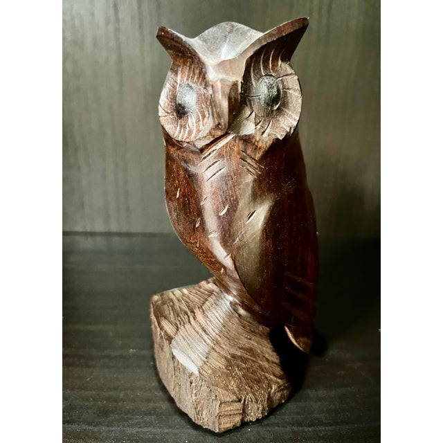 This lovely Wise owl perched and watching is carved from a single piece of ironwood. Lovely wood grain and detail expected...