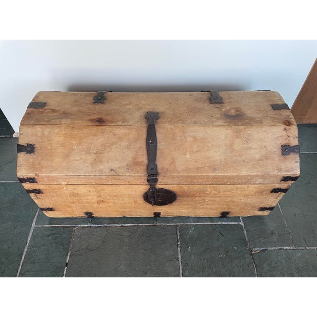 Rustic pine domed trunk with beautiful iron hardware. This trunk was purchased from a fine early American collection from...