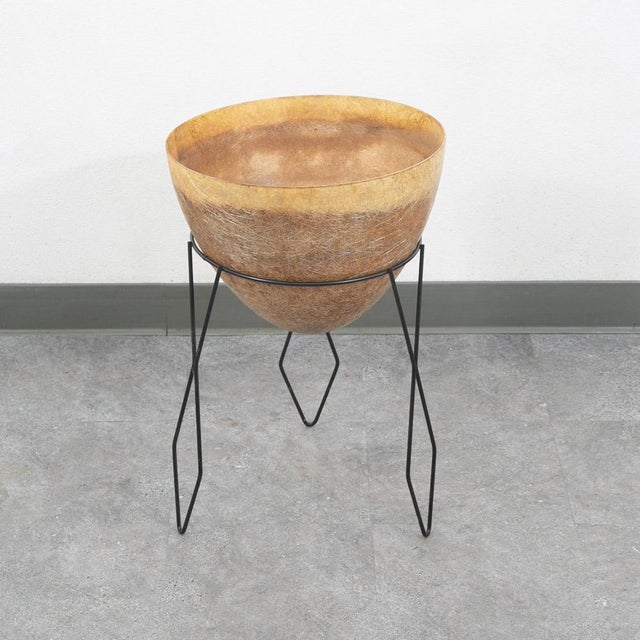 Medium sized tan 1960s fiberglass bullet planter. Great stylish piece for your home or garden outdoors. These round bullet...