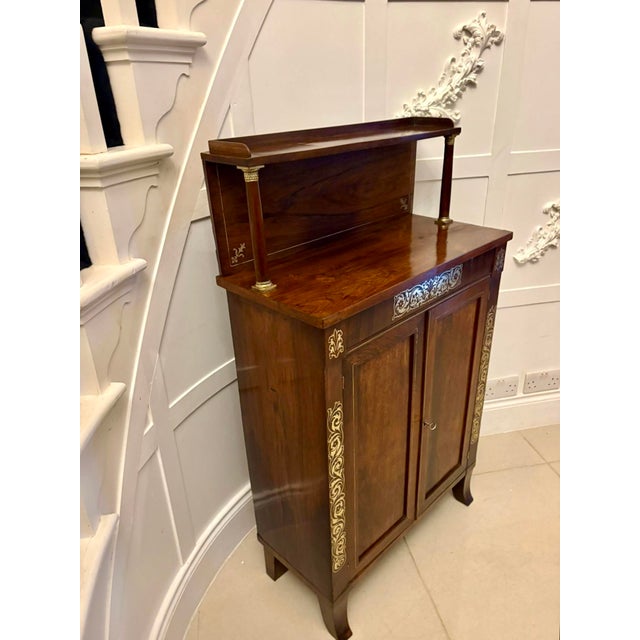 A superb early 19th-century Regency mahogany chiffonier of elegant form enriched with finely executed brass inlay and...
