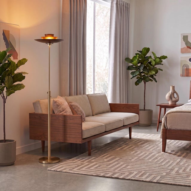The Rancho Mirage Arc Lamp is a Mid-Century Modern masterpiece, featuring a weather brass steel frame and a substantial...