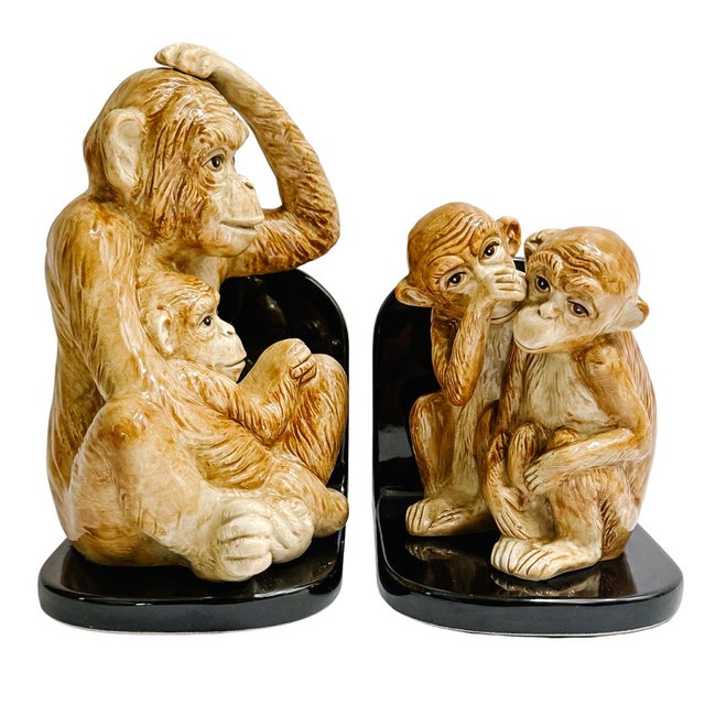 This pair of vintage 1986 glazed porcelain monkey bookends by Fitz and Floyd is full of whimsey and Hollywood Regency...