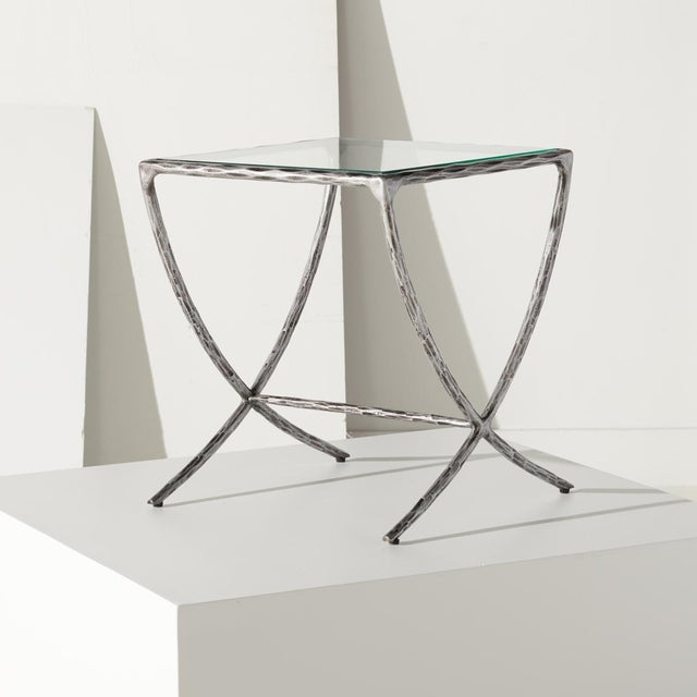 Invite a touch of glam and sophistication with our Debbie accent table. Our sleek and minimal accent table features a...