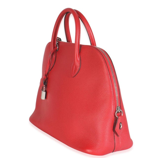 Item #: 148876 Exterior Material: Leather Size: 30 Interior Material: Leather Dimensions: 12 x 9.25 x 4.75 in Features...