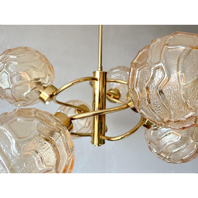 Beautiful mid-century design in Hollywood Regency style. 1970s Sputnik lamp made by the German company Wortmann & Filz....