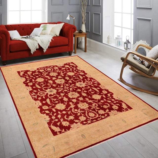 "Enhance the ambiance of your home with this magnificent Persian-influenced Turkish hand-knotted rug made by skilled...