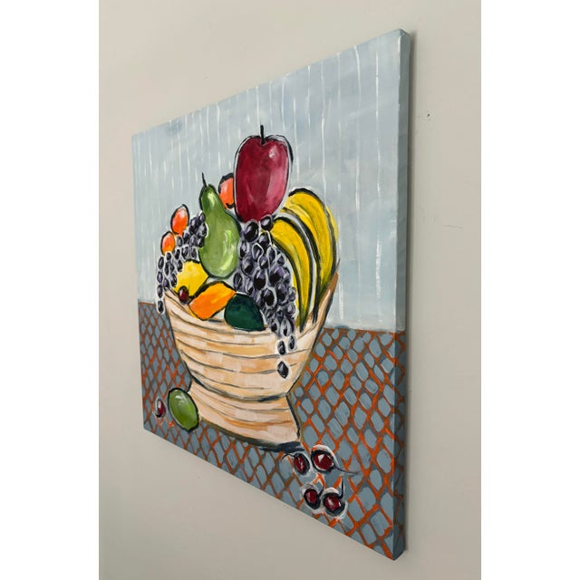 “Fruit Bowl” is an original, contemporary, acrylic painting on canvas. Two bananas, an apple, three clementines, a lemon,...