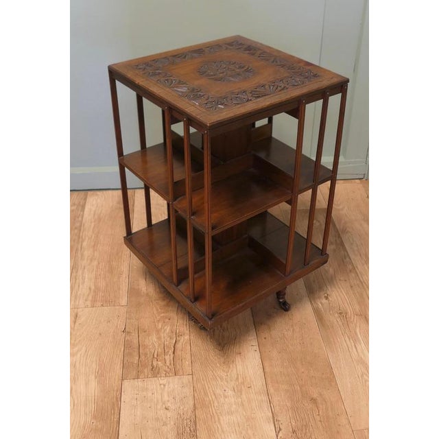 A Carved 2 Shelf Revolving Oak Bookcase The Bookcase is excellent Quality it has access to the books on 2 levels and all 4...