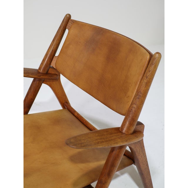 CH28 Lounge Chair in Oak and Cognac Leather by Hans J. Wegner, Denmark, 1950s For Sale - Image 11 of 17