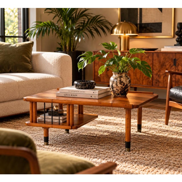 Beautiful vintage 1970s Mid-Century Modern coffee table featuring a distinctive asymmetrical, stepped two-tier design ....