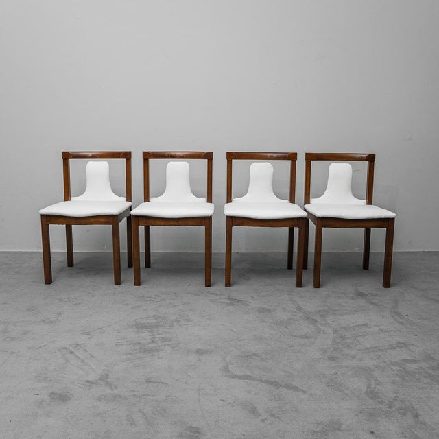 Set of 4 SC66 chairs. Designed by Claudio Salocchi for Luigi Sormani. Wooden frame with white fabric backrest and seat....