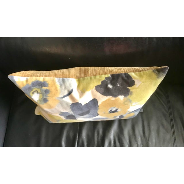 Yellow and navy watercolor flowers adorn this beautiful velvet pillow. Solid yellow cord velvet backing. Feather filling.