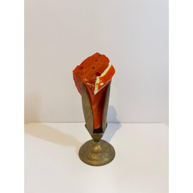 This piece appears unsigned and unmarked. It came from an important estate in the Palm Beach area. It is an abstract flame...