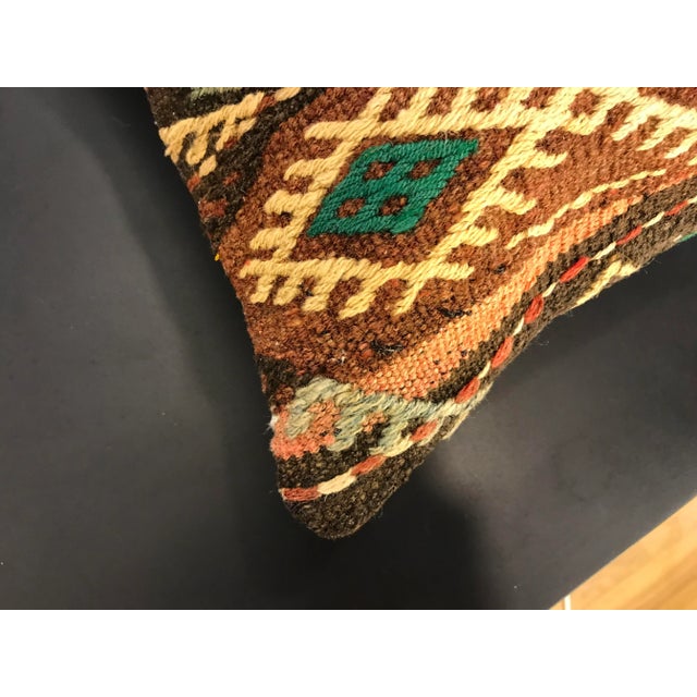 HAND WOVEN TURKISH KILIM PILLOW; Fashioned (cutted and stitched), from a 30-40 years old vintage Kilim Carpet. Each of our...